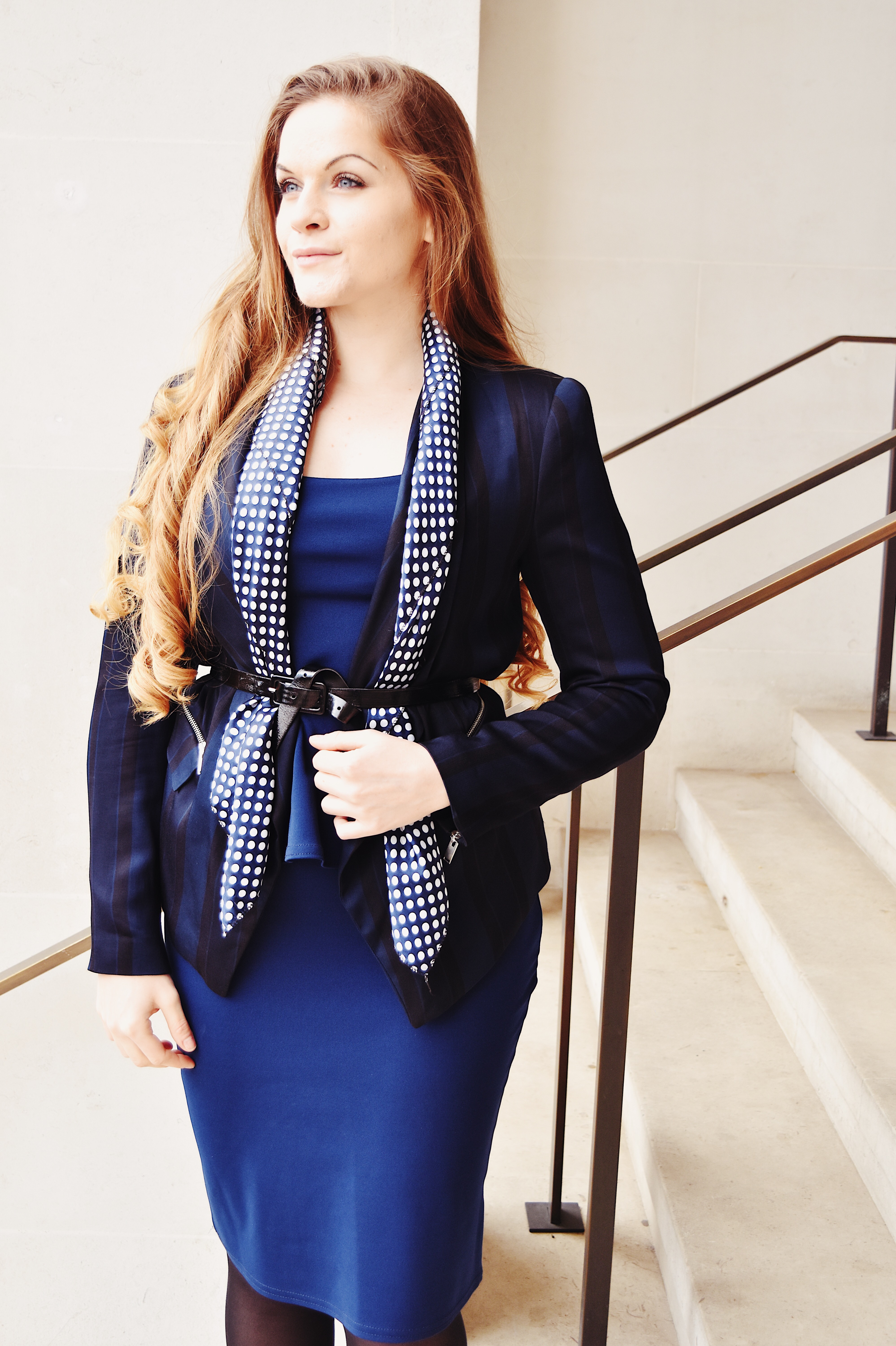 Belted Scarf workwear styling idea layered on a blue dress suit